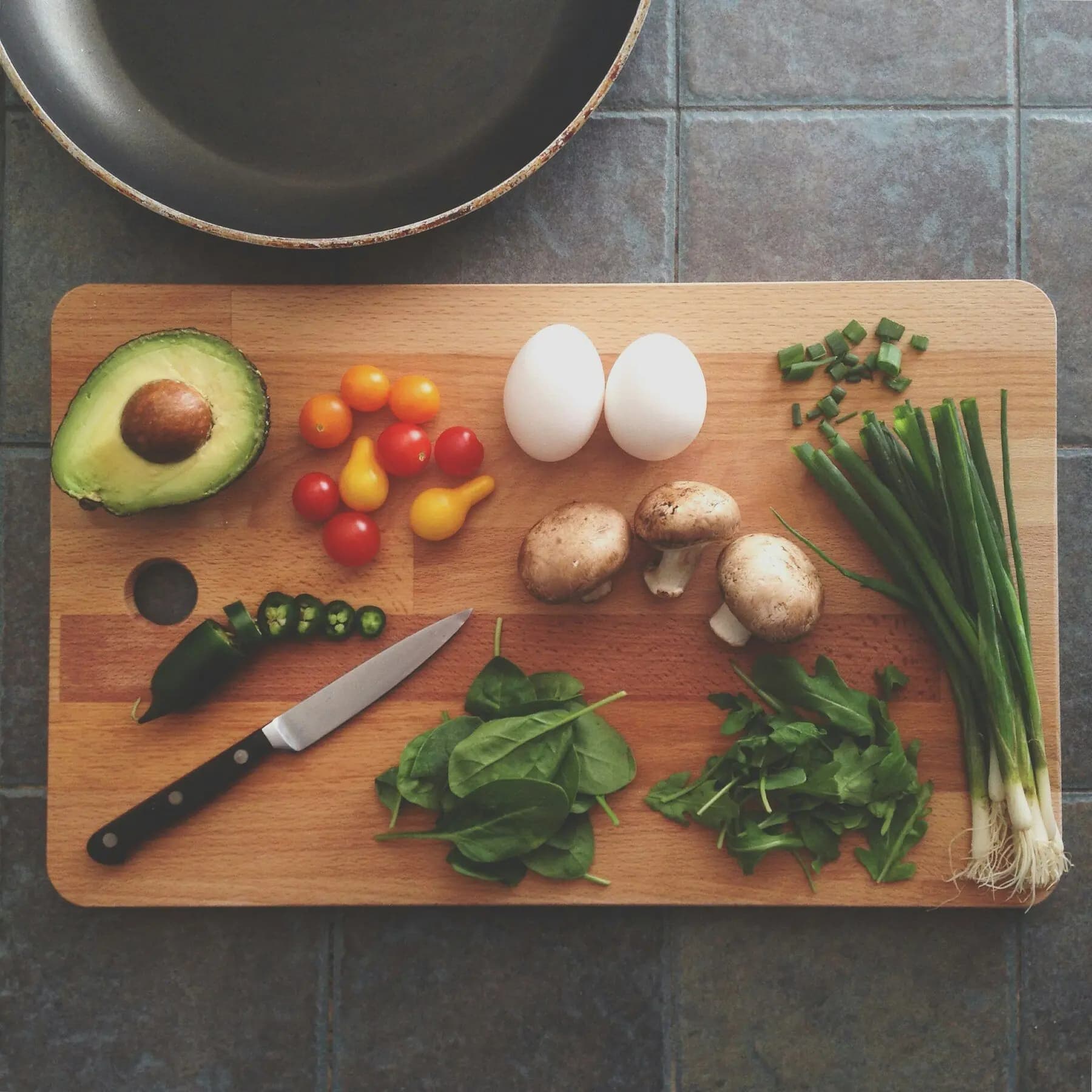 Fresh ingredients prepared on a wooden board